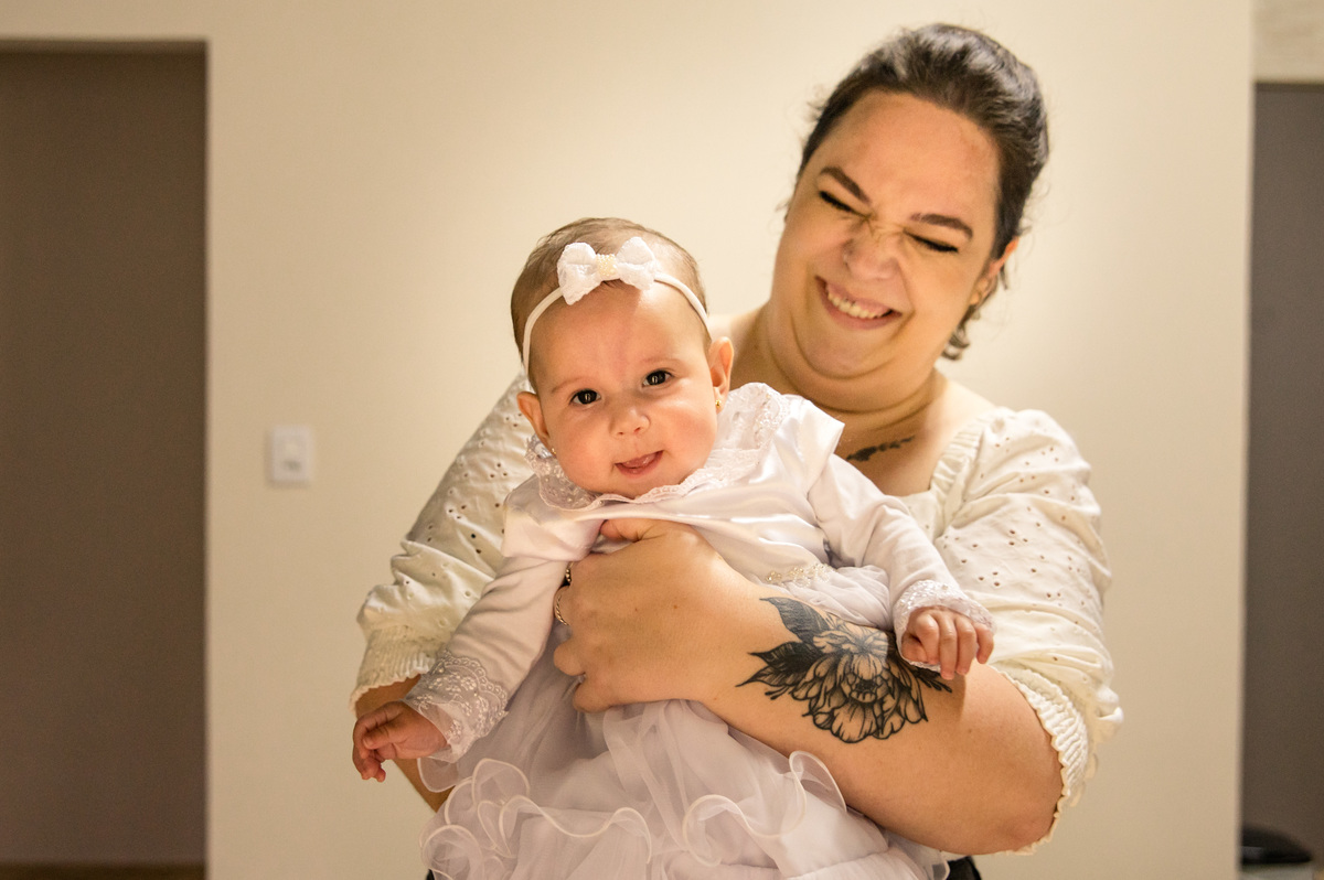 batismo batizado - bebê no colo da dinda