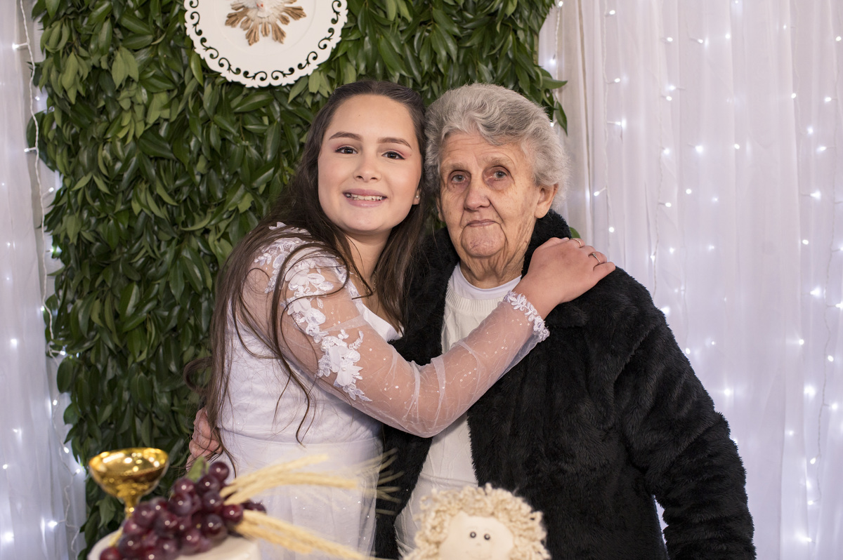 Foto com a bisavó na festa de primeira comunhão