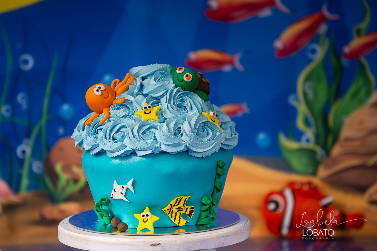 hora-do-bolo-smash-the-cake-aniversario-de-1-ano-tema-de-festa-mundo-bita-fotografia-de-smash-the-cake-mundo-bita-fundo-do-mar-estudio-fotografico-em-barbacena-isabela-lobato-fotografia-infantil-melhor-fotografo-em-barbacena-isabela-lobato