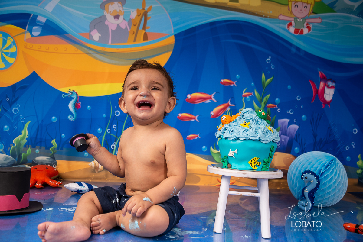 hora-do-bolo-smash-the-cake-aniversario-de-1-ano-tema-de-festa-mundo-bita-fotografia-de-smash-the-cake-mundo-bita-fundo-do-mar-estudio-fotografico-em-barbacena-isabela-lobato-fotografia-infantil-melhor-fotografo-em-barbacena-isabela-lobato