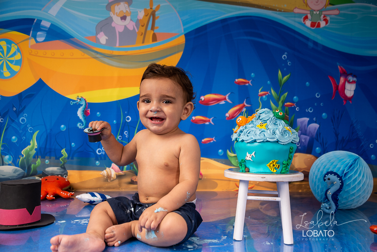 hora-do-bolo-smash-the-cake-aniversario-de-1-ano-tema-de-festa-mundo-bita-fotografia-de-smash-the-cake-mundo-bita-fundo-do-mar-estudio-fotografico-em-barbacena-isabela-lobato-fotografia-infantil-melhor-fotografo-em-barbacena-isabela-lobato