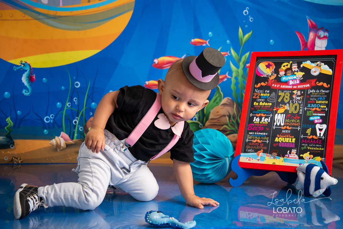 smash-the-cake-mundo-bita-no-fundo-do-mar-ensaio-fotografico-infantil-de-um-ano-esmagando-o-bolo-a-hora-do-bolo--fundo-do-mar-festa-mundo-bita-fotografa-infantil-em-barbacena-minas-gerais-isabela-lobato-fotografia-melhor-fotografa-de-barbacena-bq-mg