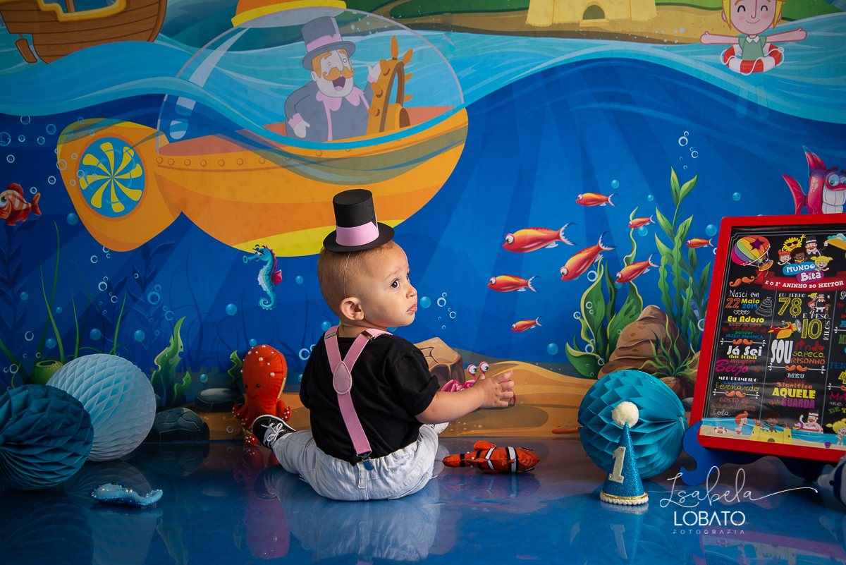 smash-the-cake-mundo-bita-no-fundo-do-mar-ensaio-fotografico-infantil-de-um-ano-esmagando-o-bolo-a-hora-do-bolo--fundo-do-mar-festa-mundo-bita-fotografa-infantil-em-barbacena-minas-gerais-isabela-lobato-fotografia-melhor-fotografa-de-barbacena-bq-mg