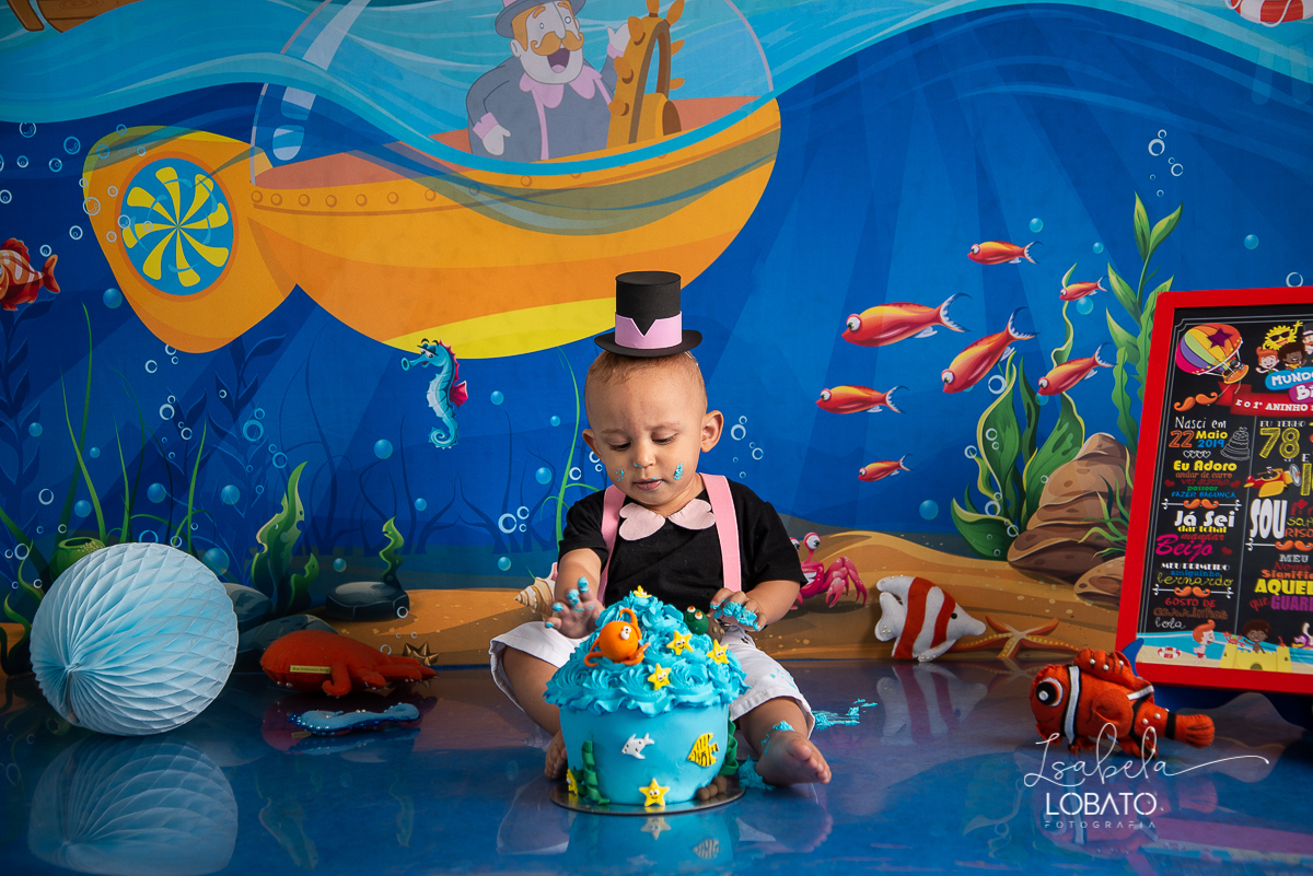smash-the-cake-mundo-bita-no-fundo-do-mar-ensaio-fotografico-infantil-de-um-ano-esmagando-o-bolo-a-hora-do-bolo--fundo-do-mar-festa-mundo-bita-fotografa-infantil-em-barbacena-minas-gerais-isabela-lobato-fotografia-melhor-fotografa-de-barbacena-bq-mg