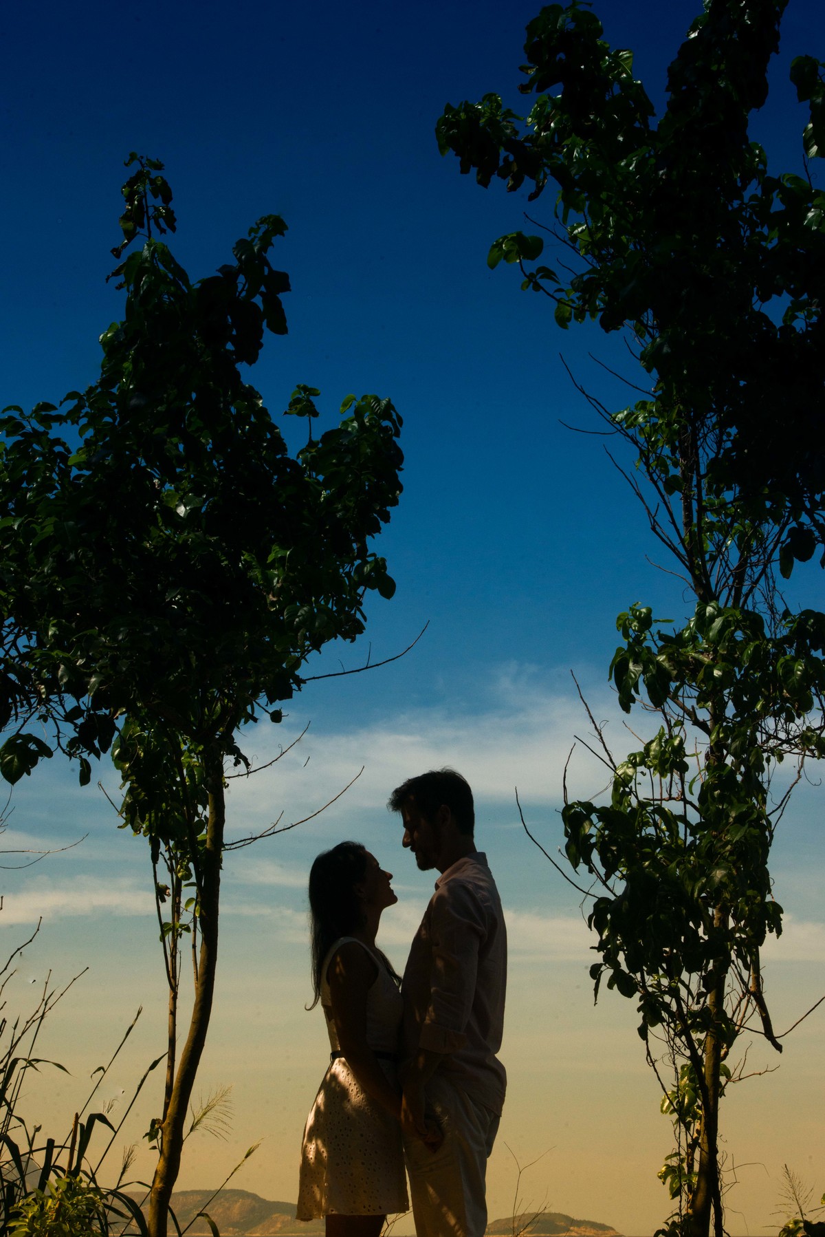 uma foto de silhueta do casal na Pista Claudio Coutinho