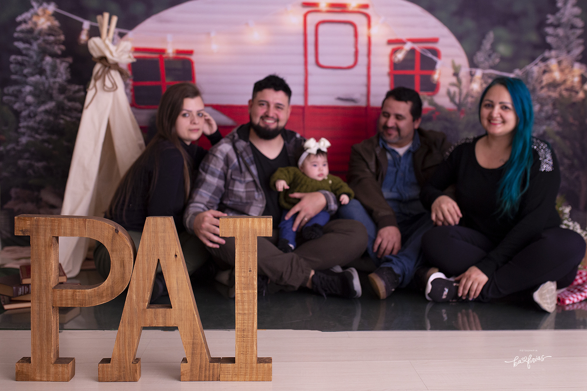a familia participa da sessão de dia das maes