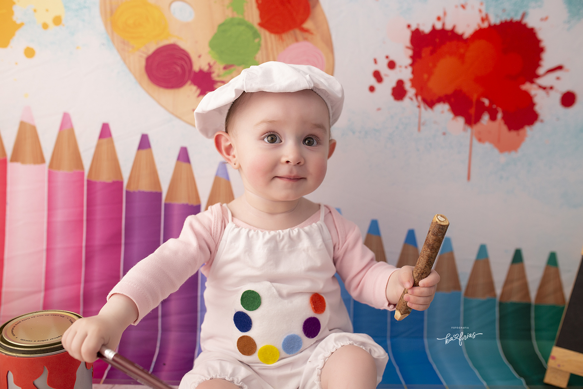 a bebe sorri no ensaio infantil