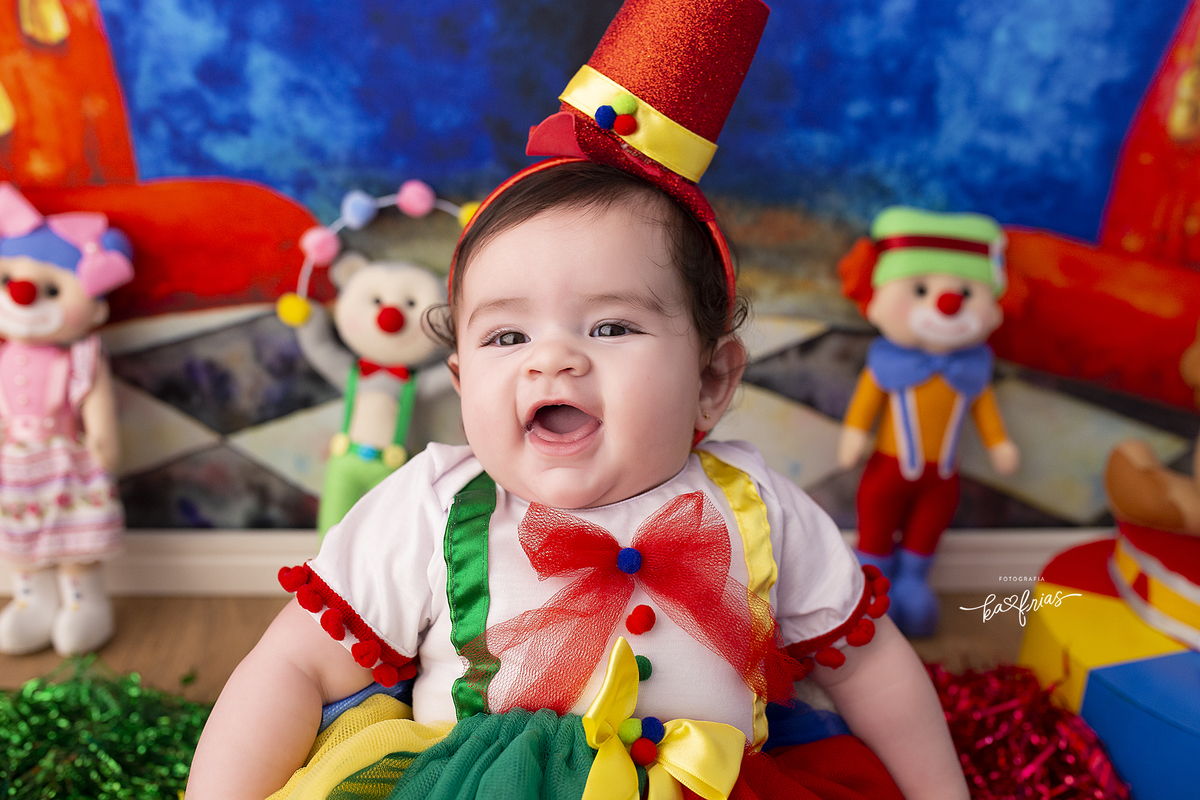 a menina sorri para a fotografa de caxias do sul, ka frias