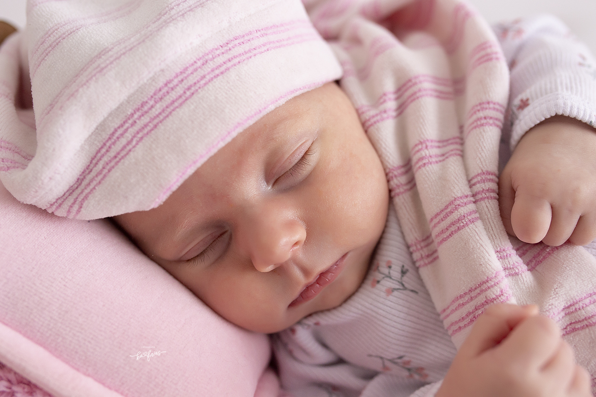 no ensaio infantil, a bebe esta dormindo