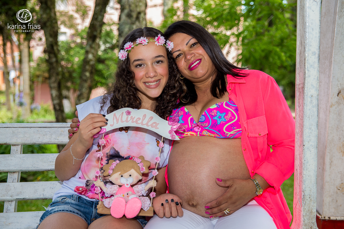 a filha do casal participa do ensaio gestante