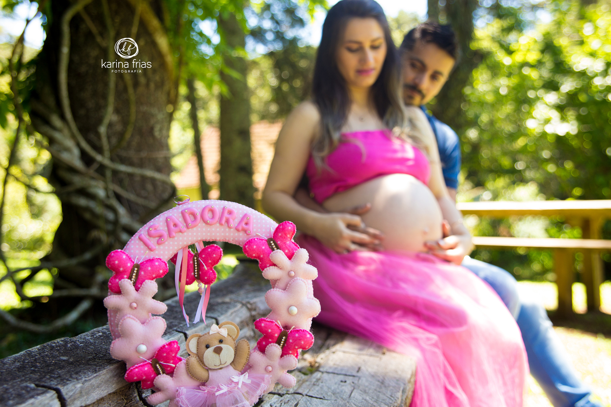 a gestante levou o enfeite de porta para as fotos do seu book
