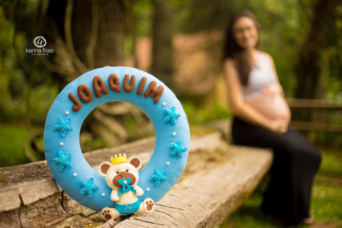 NO ENSAIO DE GESTANTE PODE-SE LEVAR ACESSORIOS COMO LETREIROS E ENFEITES DE PORTA