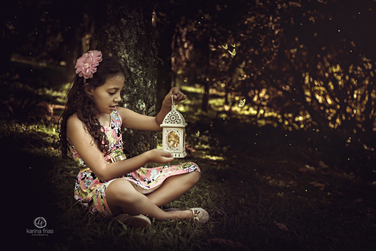 no ensaio externo de familia utilizamos um lampiao aceso como acessorio