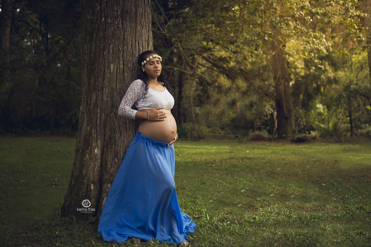 a gestante sente o sol durante as fotos do book externo