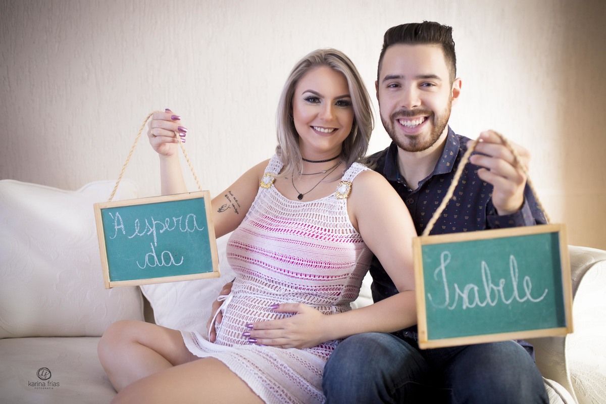 no ensaio de gestante levamos plaquinhas 