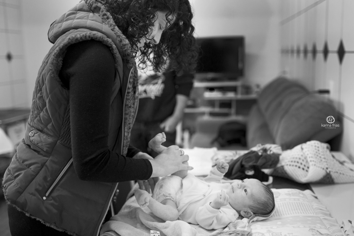 a mae troca o filho no ensaio em casa