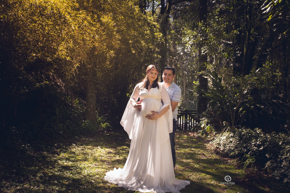 OS PAIS POSAM PARA O ENSAIO EXTERNO DE GESTANTE