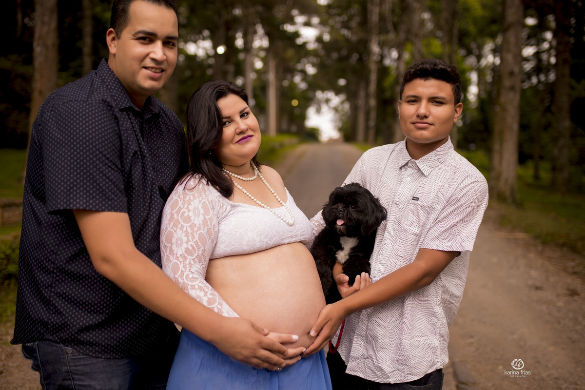 a familia participou do ensaio de gestante
