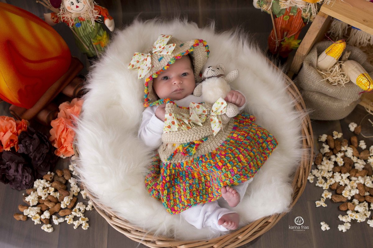 no ensaio infantil decoramos o cenario com pipocas e amendoins