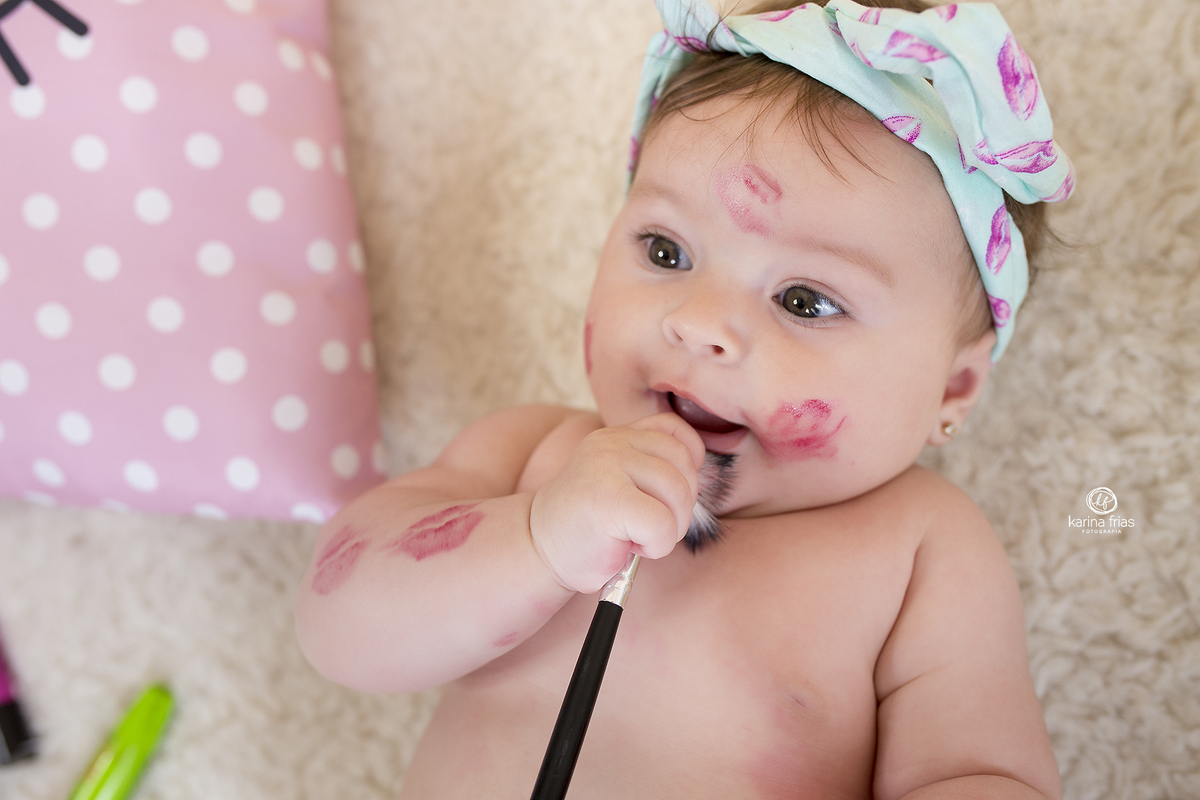 a fotografa de familia de caxias do sul registra o sorriso da bebe