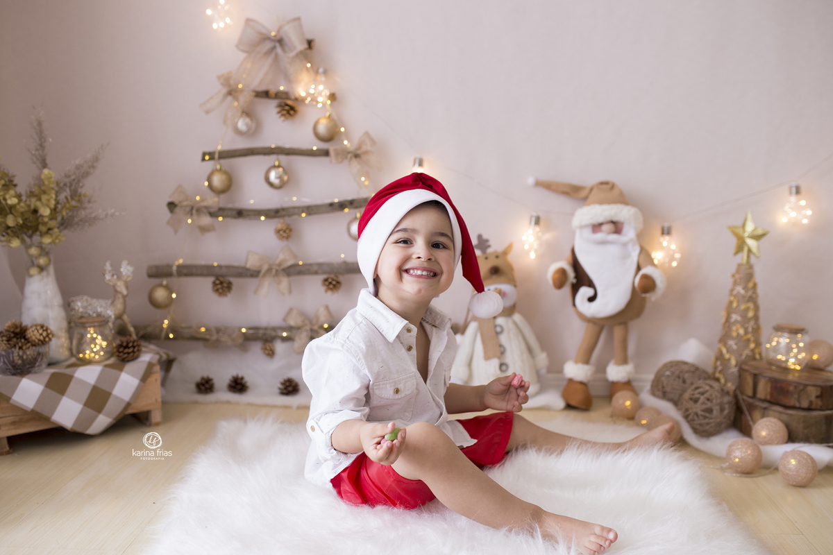 o menino sorri para a fotografa de caxias do sul, karina frias