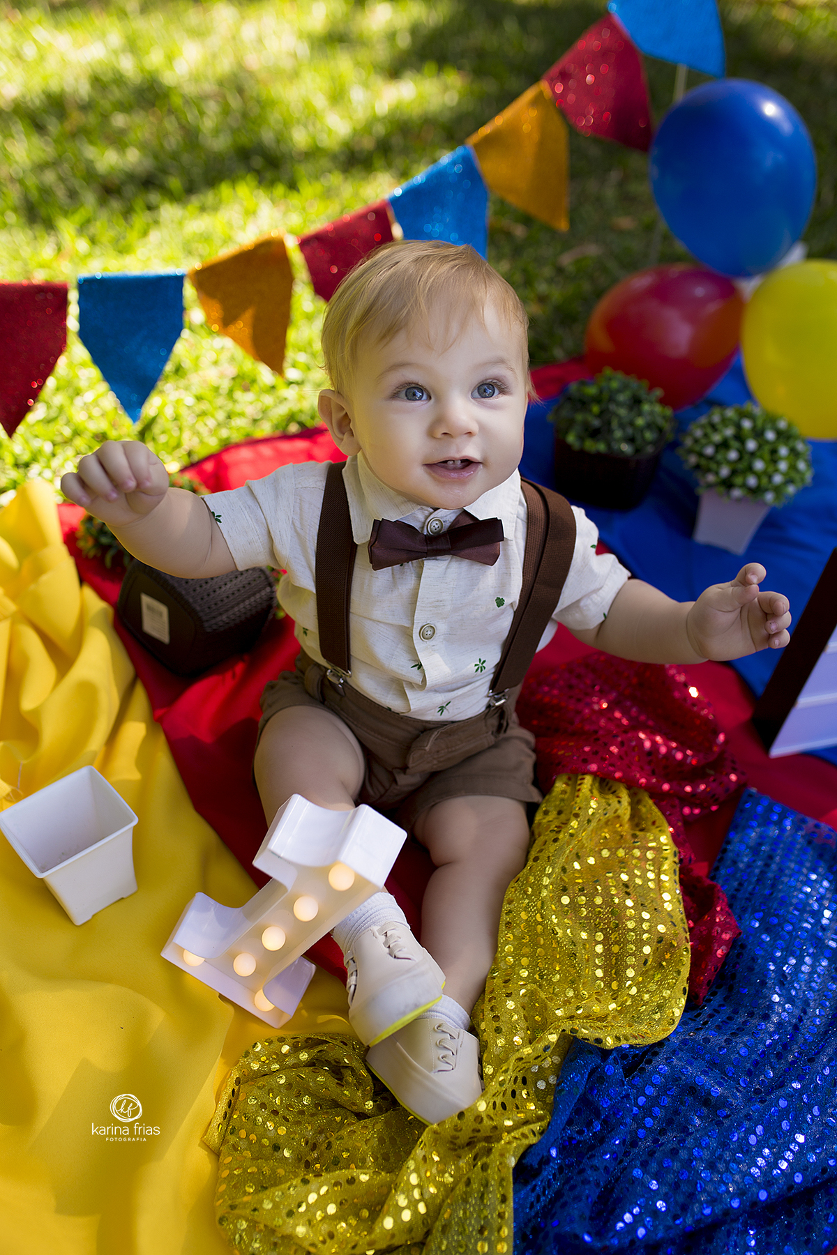 o menino sorri para a fotografa de caxias do sul, karina frias