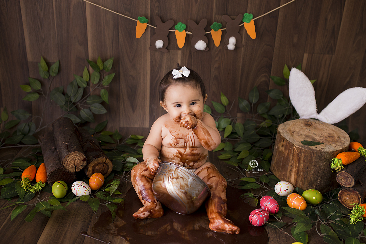 no ensaio infantil, a bebe se diverte