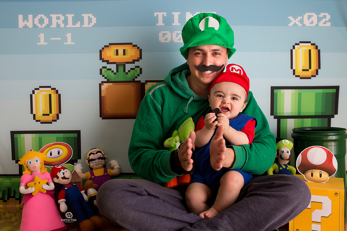 pai e filho sorriem para a fotografa de familia de caxias do sul, karina frias