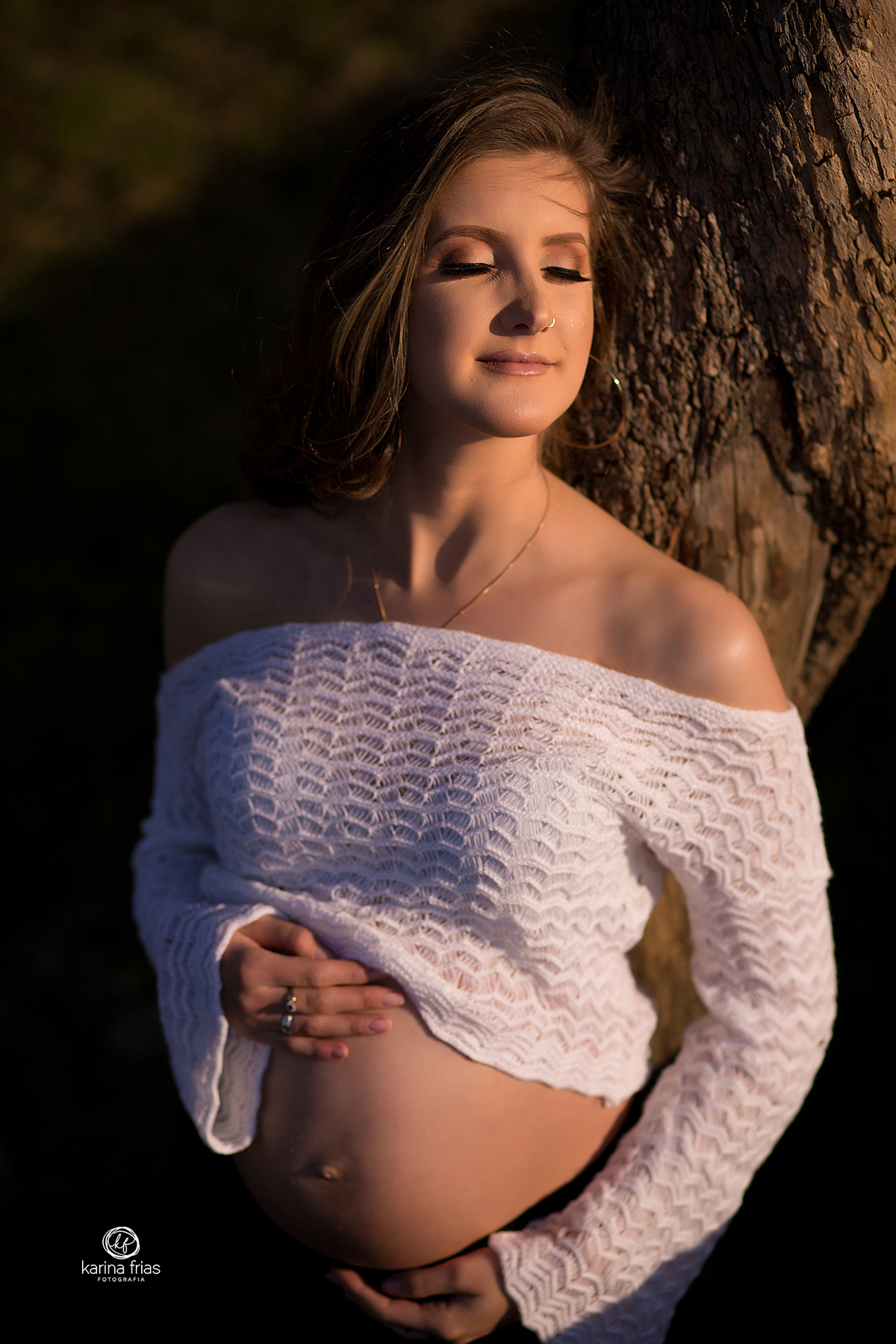 a gestante esta sob a luz do sol