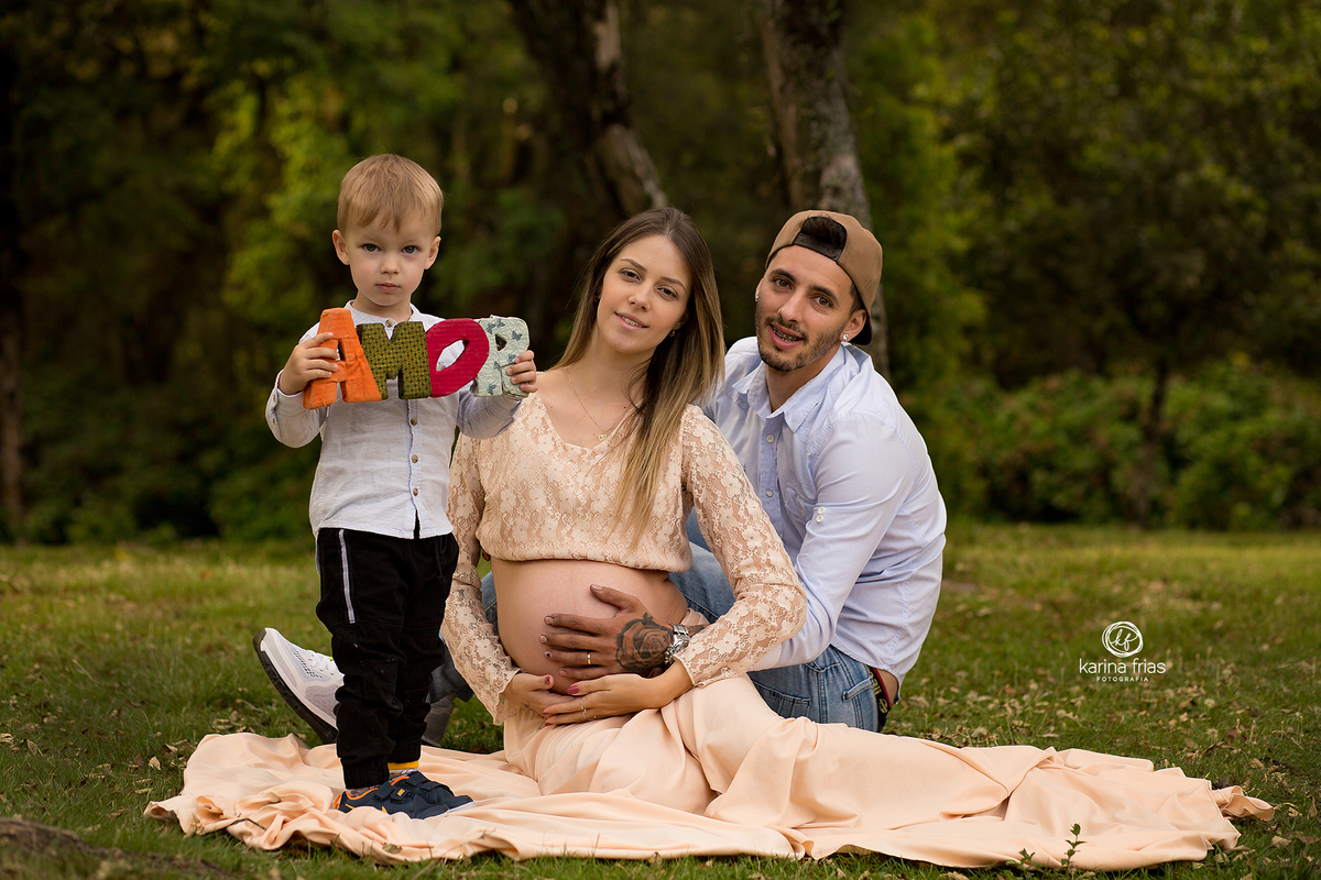 a familia participou da sessão de fotos de gestante