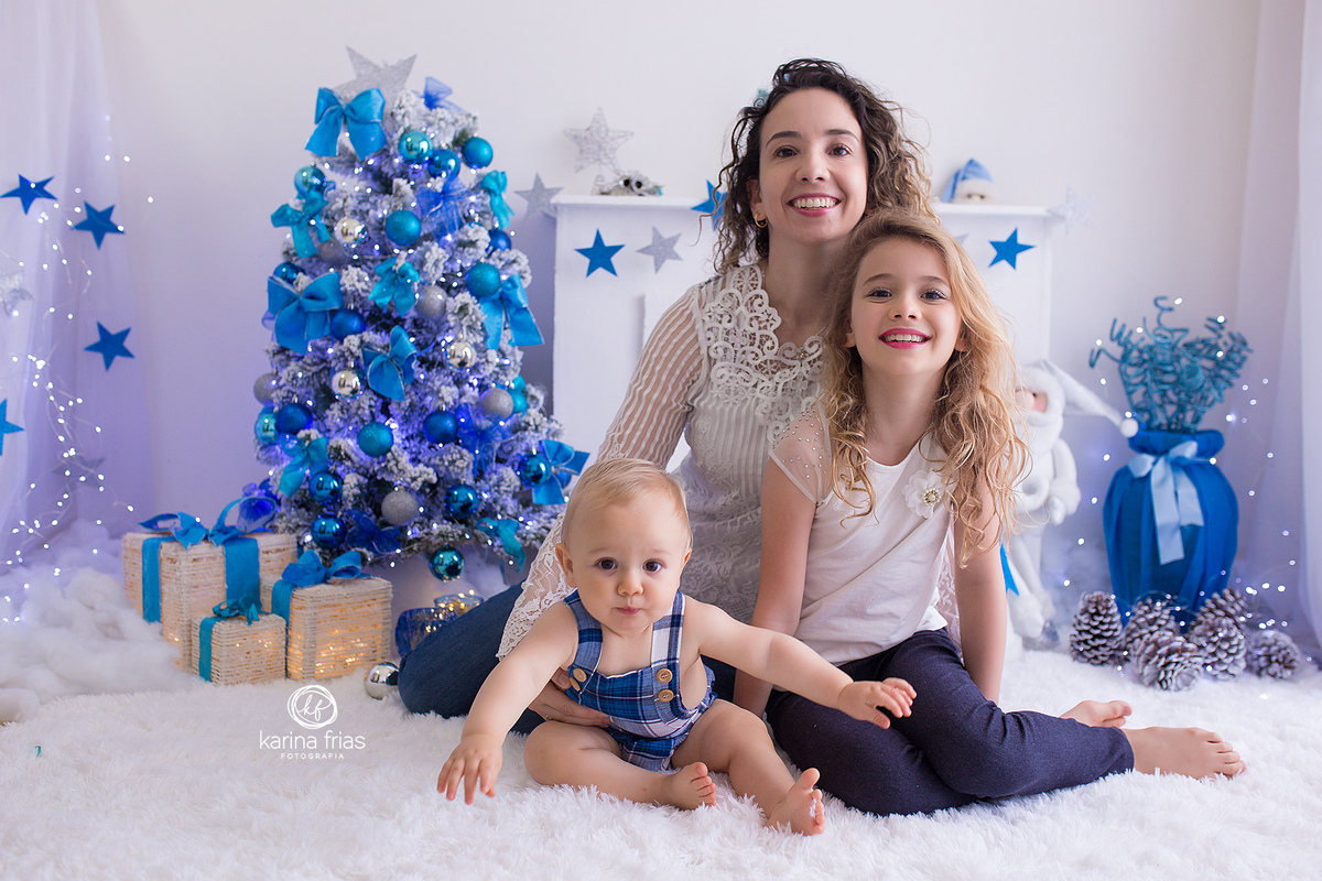 a familia olha para a fotografa de caxias do sul, karina frias
