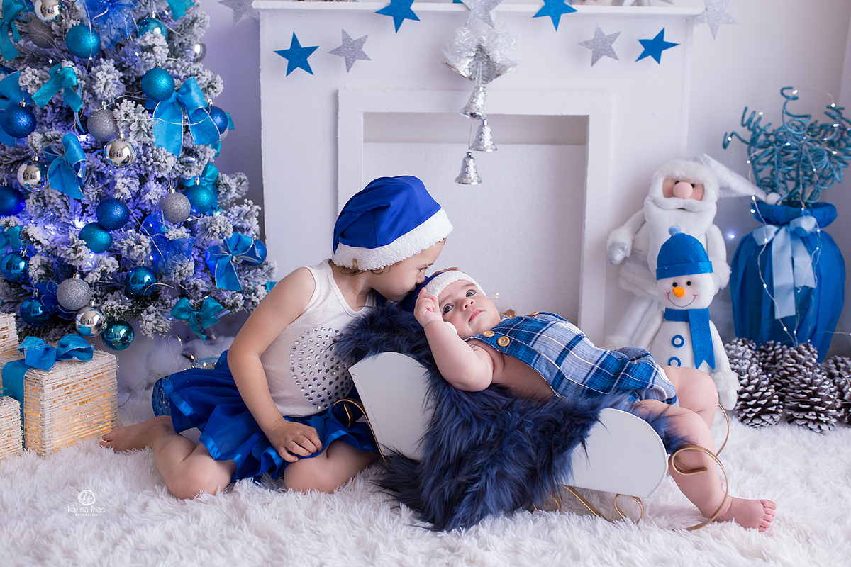 a irma beija o bebe nas fotos de natal 2020