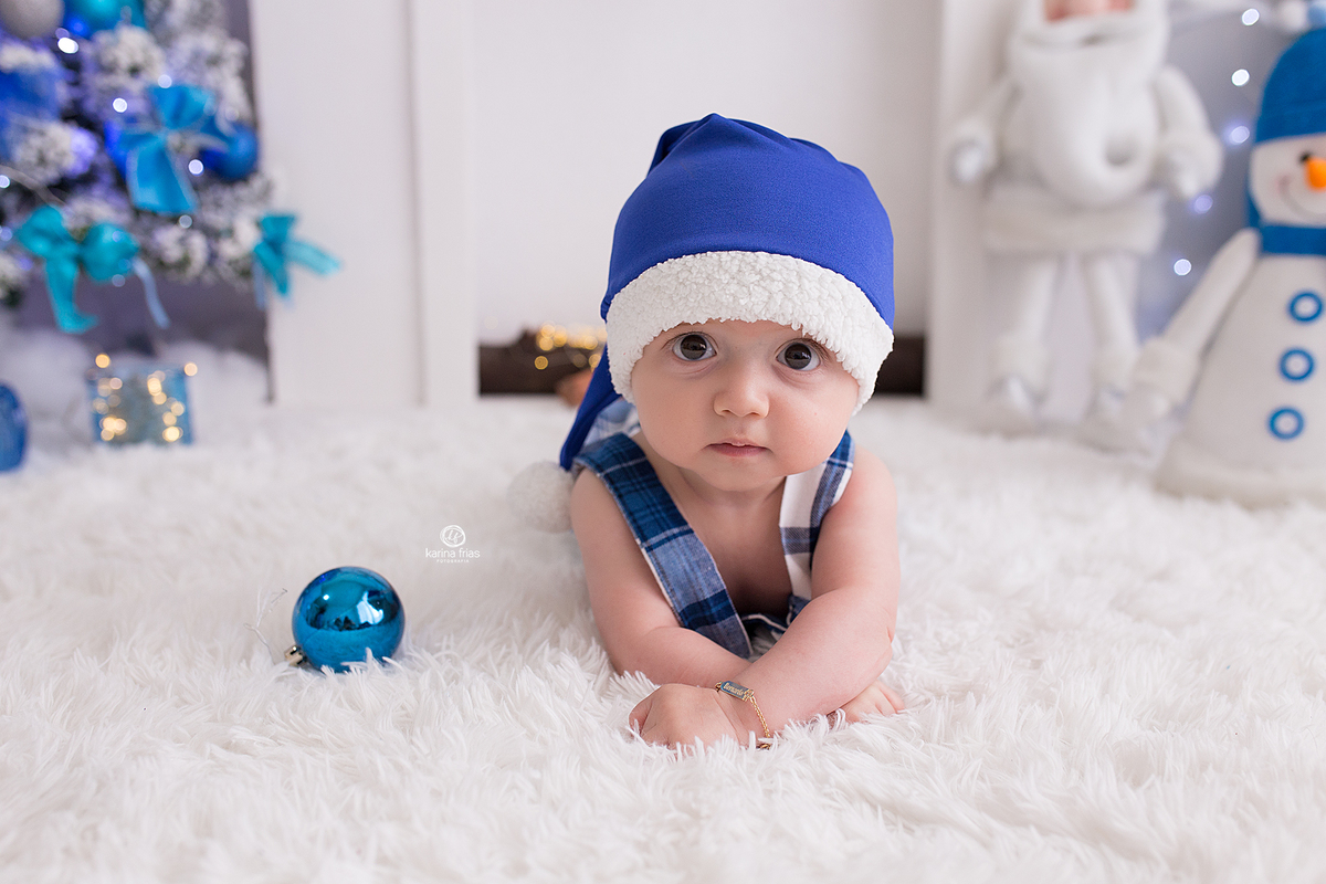 no ensaio infantil o bebe esta de bruços