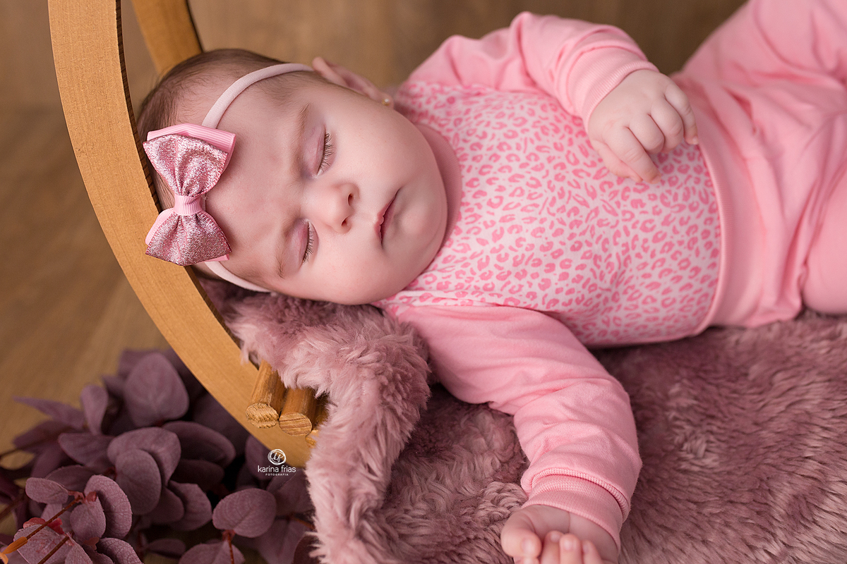 no ensaio infantil a bebe dorme