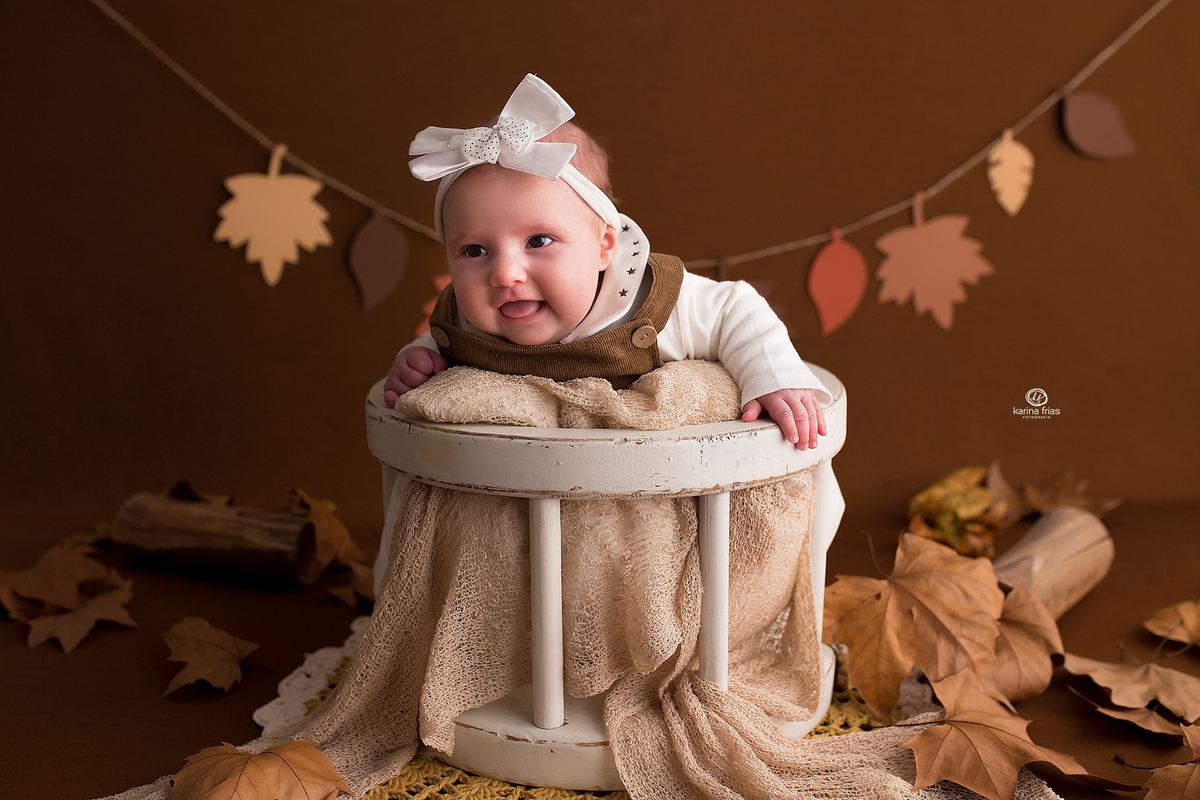 a bebe sorri na sessão de acompanhamento mensal em caxias do sul-rs