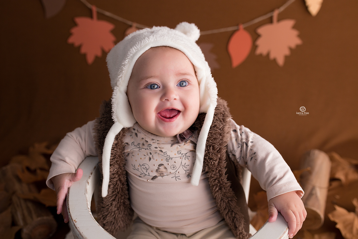 a bebe sorri na sessao de acompanhamento mensal
