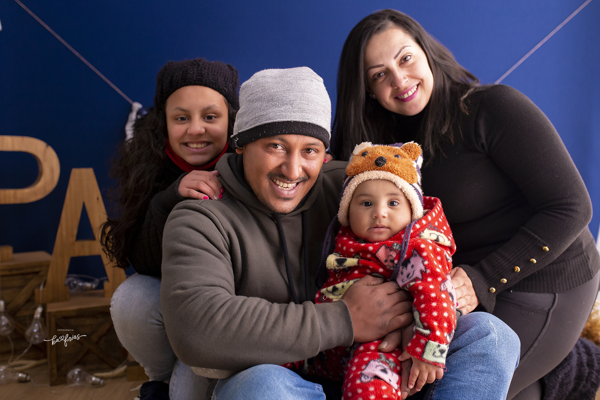 a familia sorri para a fotografa de caxias do sul, ka frias