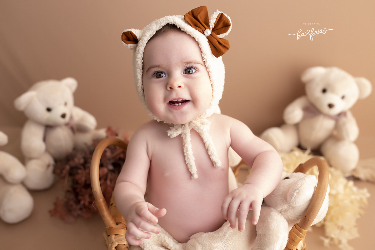 no acompanhamento mensal vestimos a bebe de ursinha