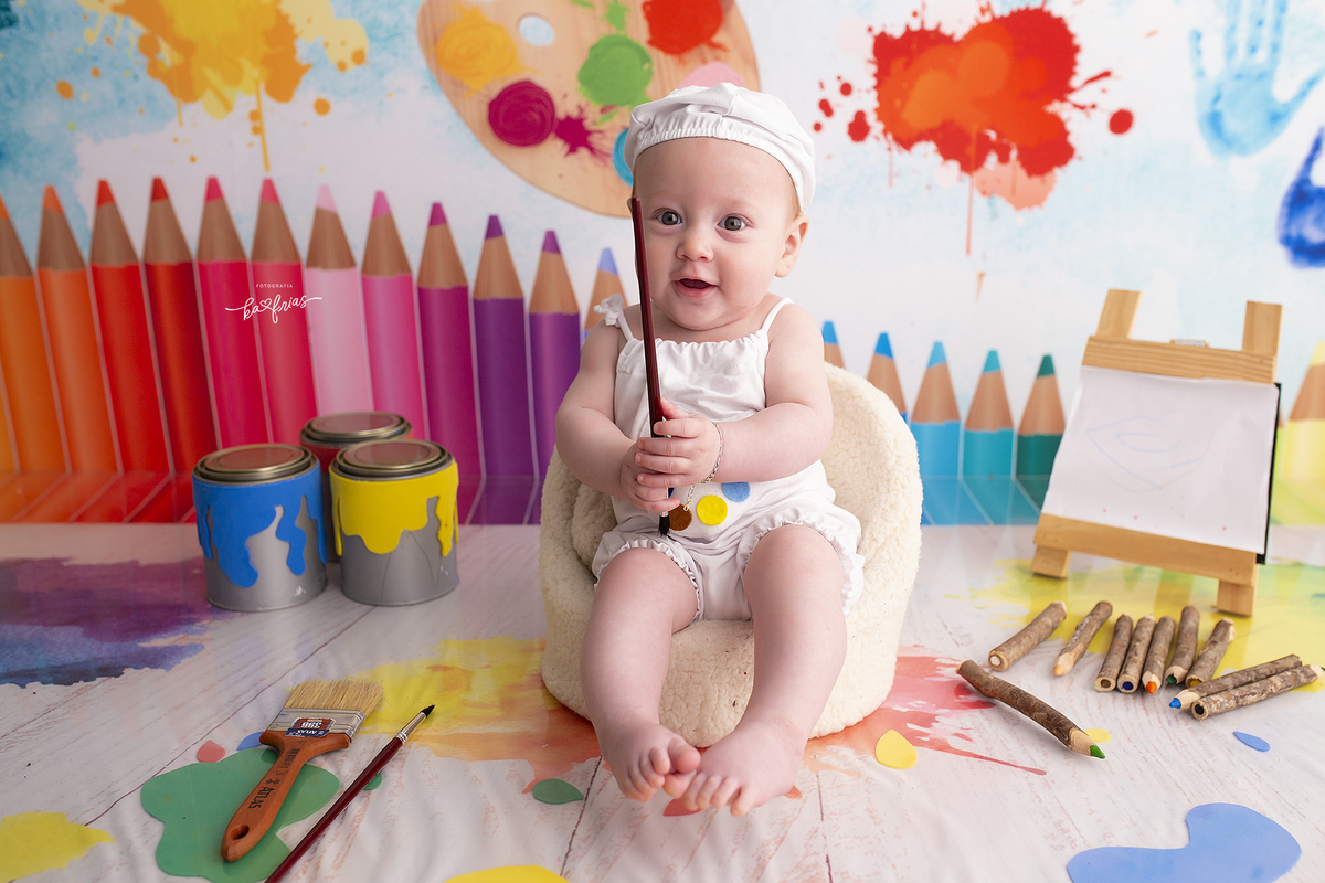 o menino sorri para a fotografa de caxias do sul, ka frias