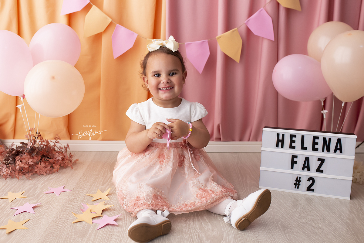 ensaio infantil para os dois anos da menina