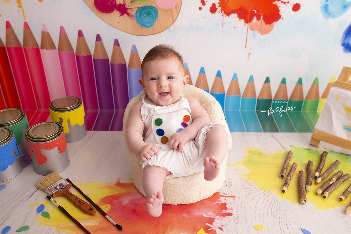 no acompanhamento mensal a bebe esta sorrindo