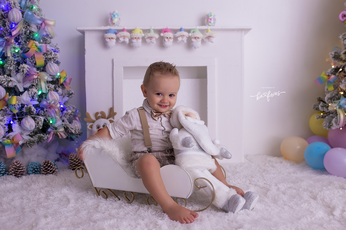 o bebe sorri no ensaio de natal