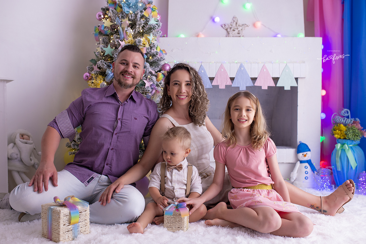 a familia esta no ensaio de natal 2021 em caxias do sul