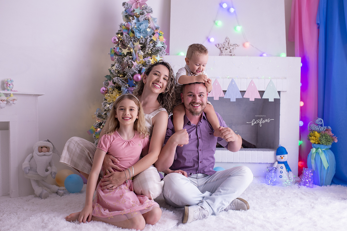 a familia esta na sessão de natal 2021 em caxias do sul-rs