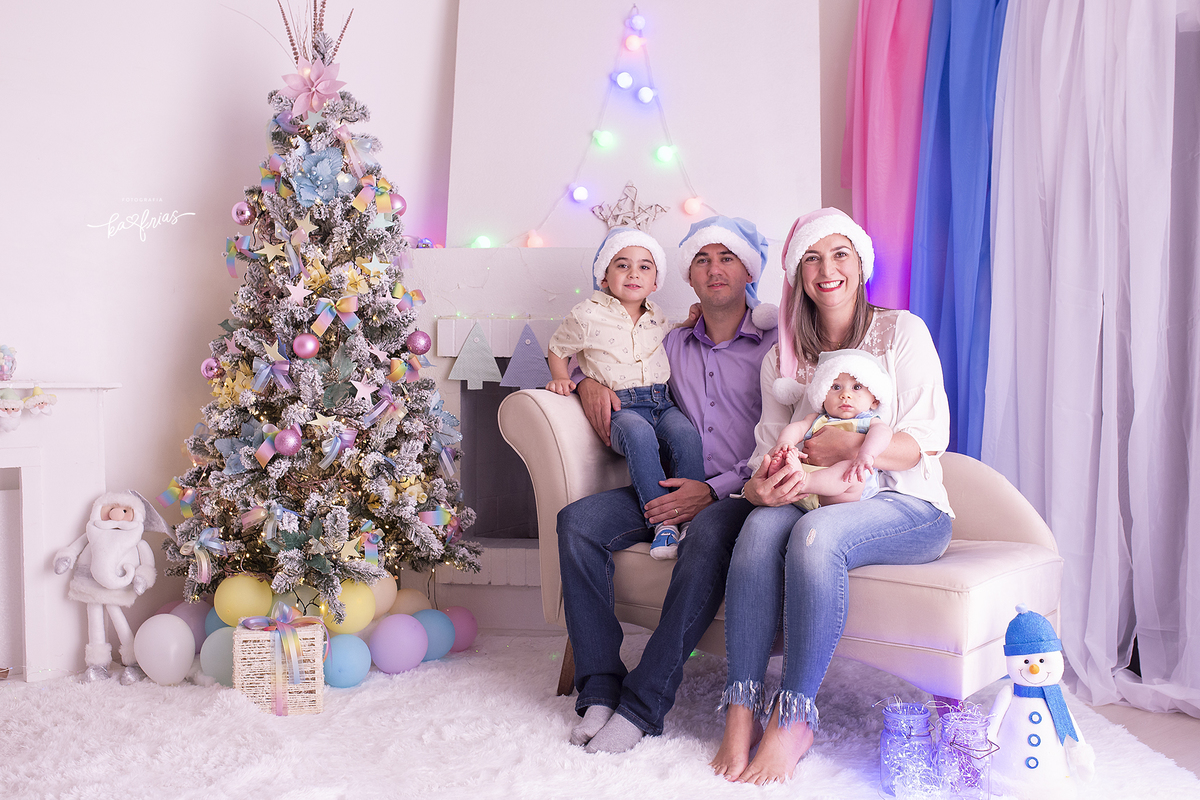 a familia posa para as fotos de natal em caxias do sul-rs