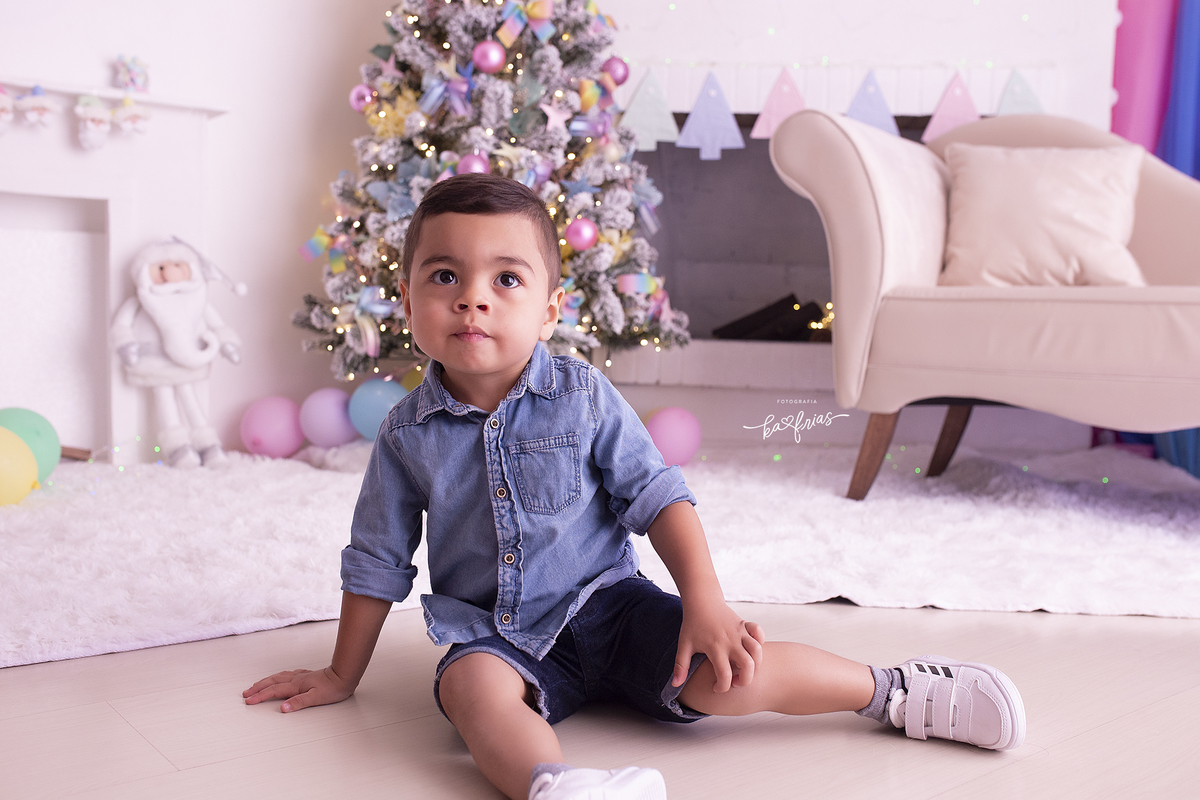 no ensaio de natal o bebe posa