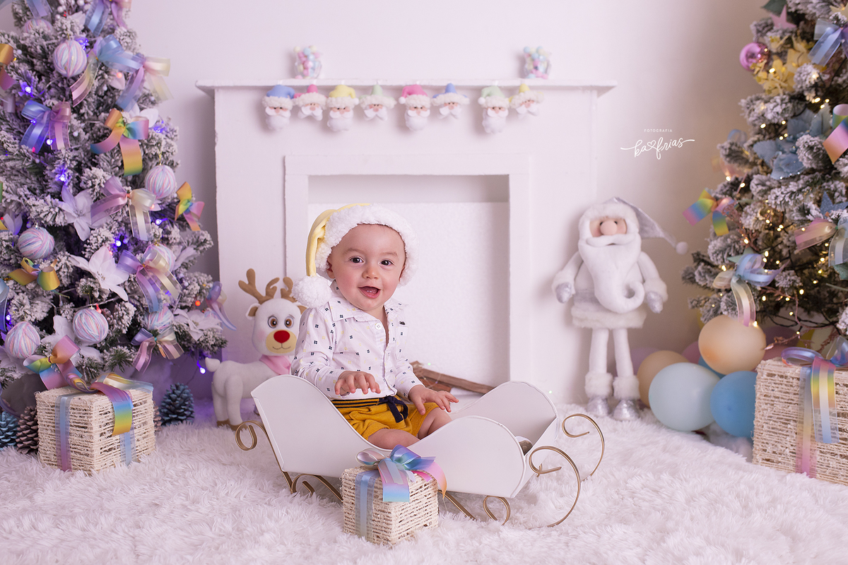 o bebe esta no treno para as fotos de natal em caxias do sul-rs