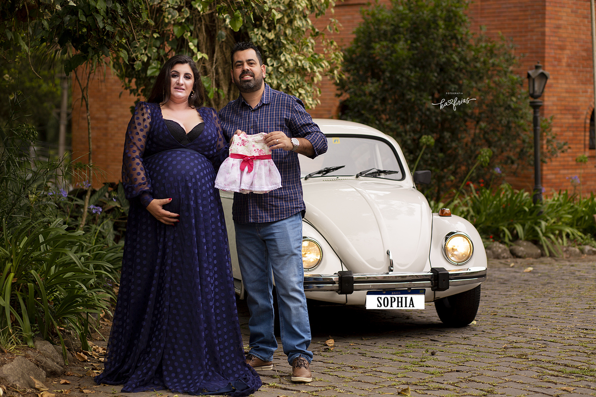 os pais posam para as fotos de gestante 