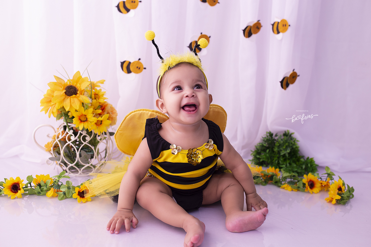 a bebe sorri nas fotos de acompanhamento mensal em caxias do sul-rs