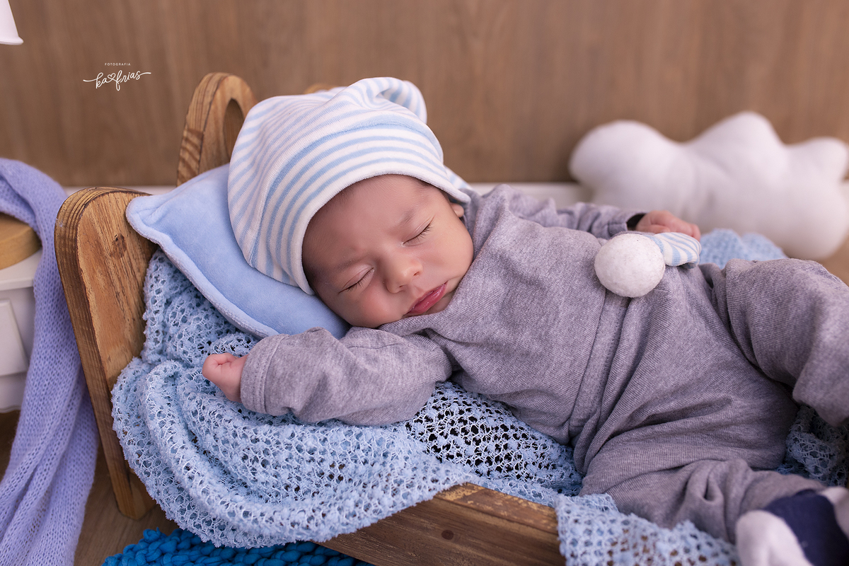 no ensaio infantil o bebe esta dormindo
